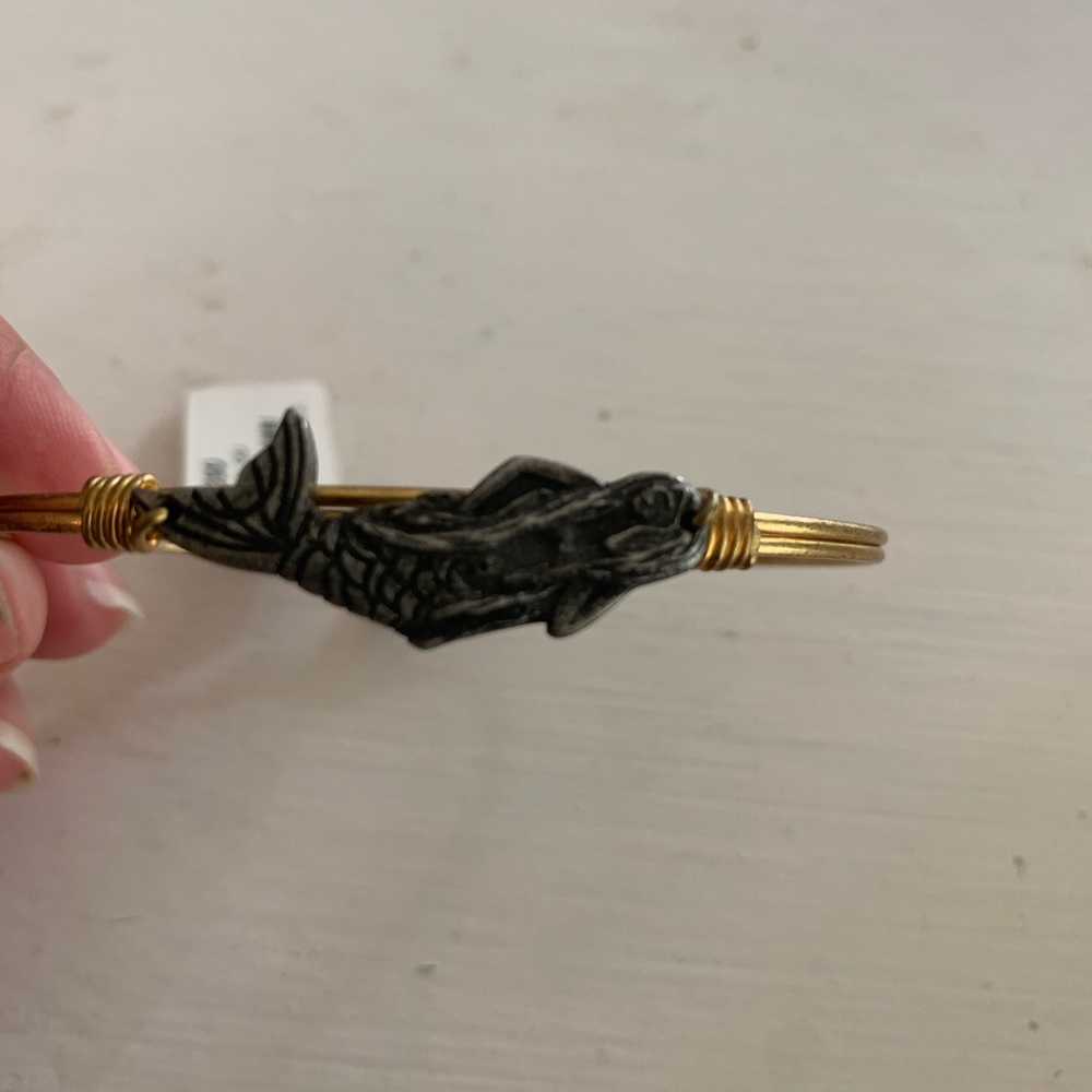 Gold stainless plated petite size mermaid bangle.